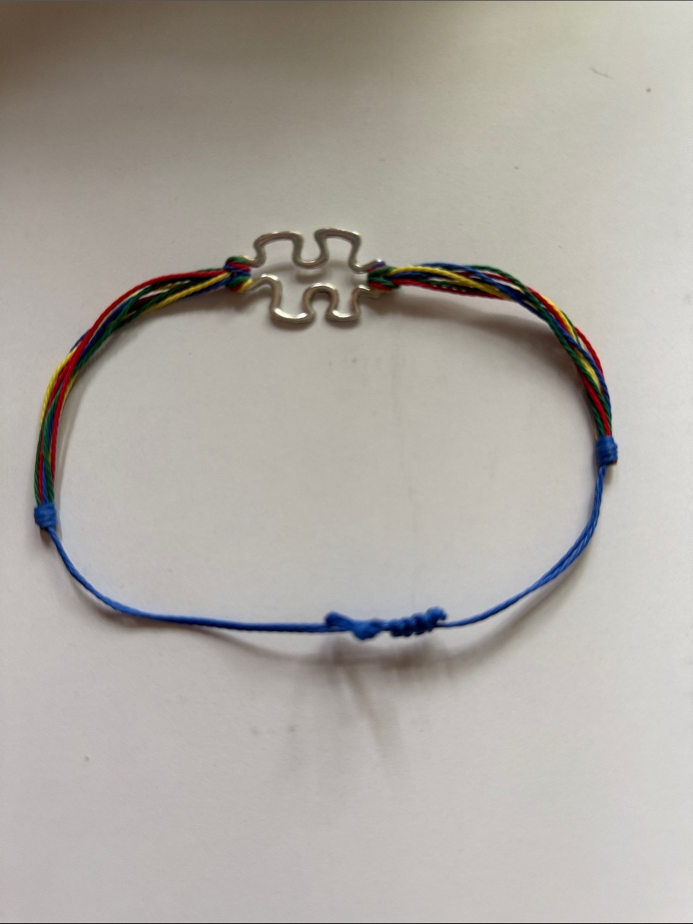 Autism Puzzle Piece Bracelet in Rainbow and Blue